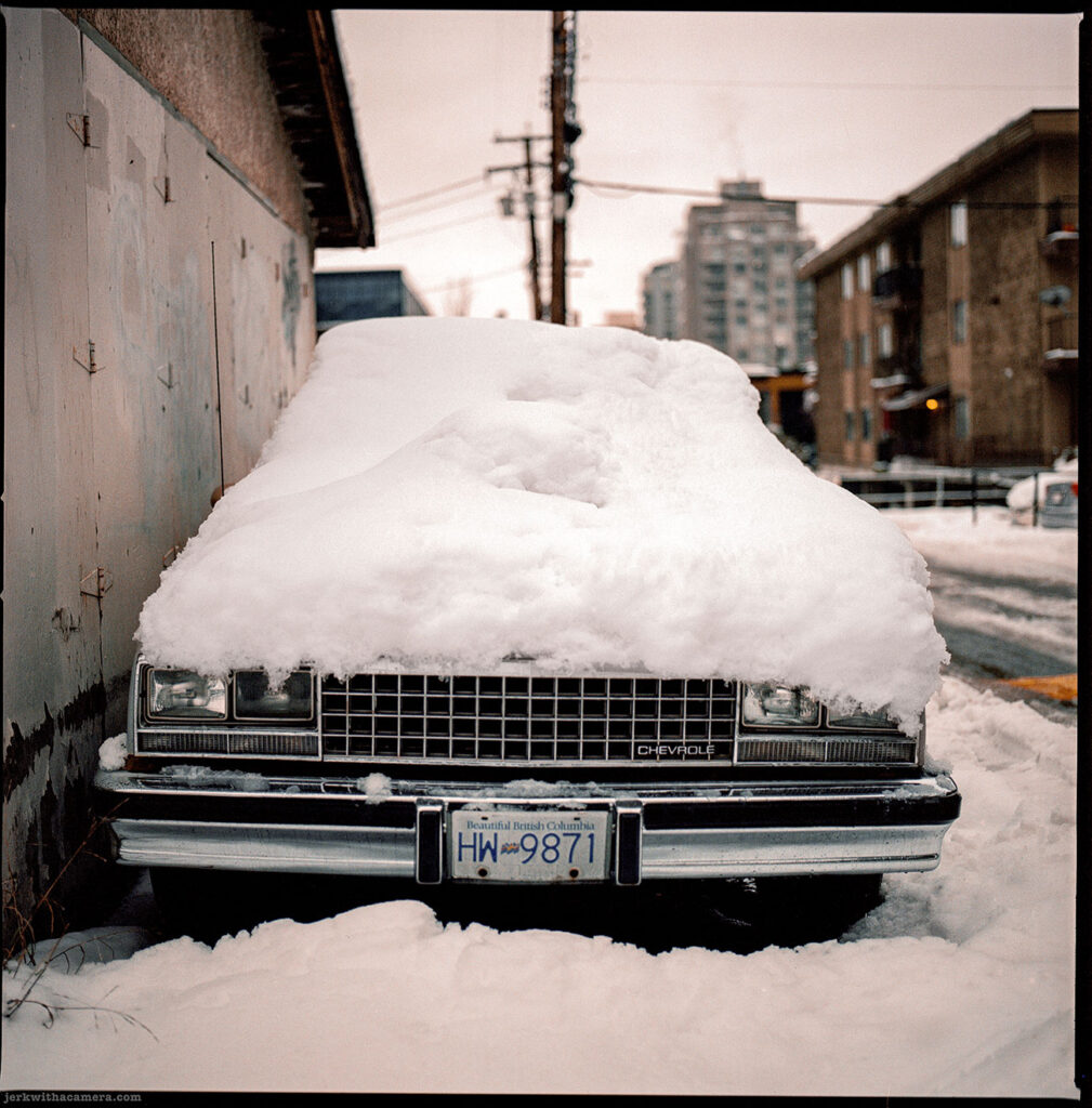a Photo of a snowy El camino taken on Kodak Portra 400 Film with my Hasselblad 500 C/M and a varsity of Hasselblad Lens Like the Carl Zeiss planar 80mm f/2.8 and the Carl Zeiss Sonnar 150mm f/4